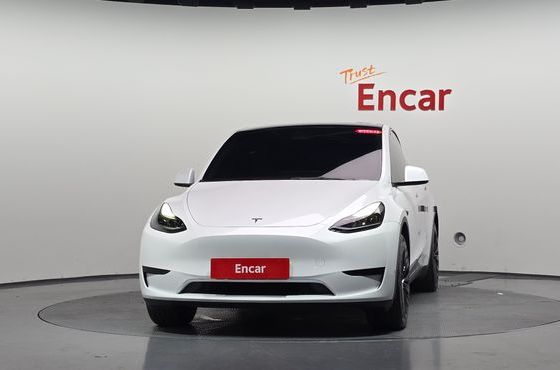 Tesla Model Y RWD — пробег 27 558 км — фото 3 из 5