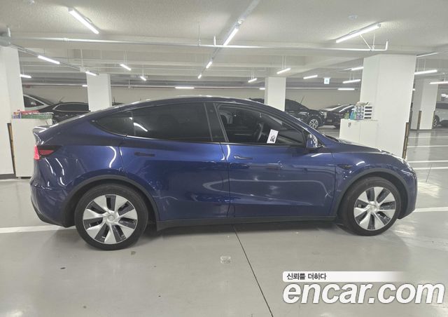 Tesla Model Y RWD — пробег 42 783 км — фото 5 из 5