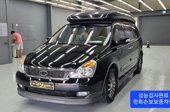 Kia Carnival Grand Carnival HI Limousine GLX — пробег 123 390 км — фото 1 из 5