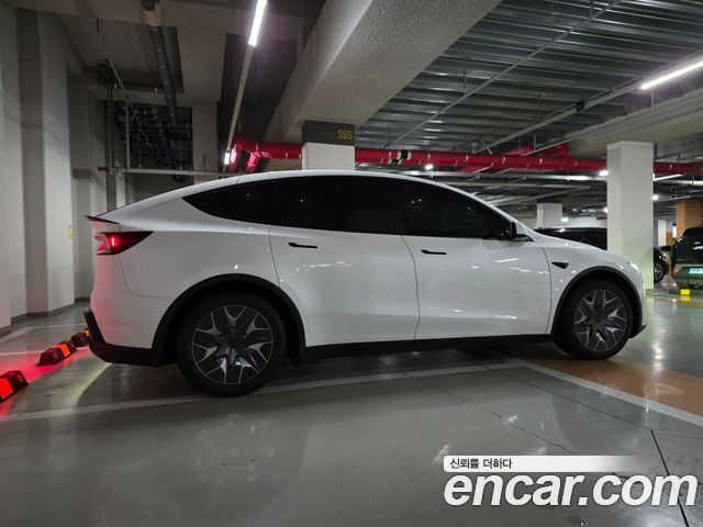 Tesla Model Y L Long Range AWD — пробег 12 км — фото 3 из 5
