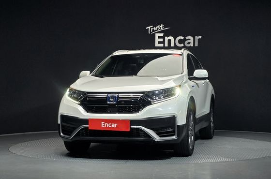 Honda CR-V 2.0 Hybrid Touring 4WD — пробег 54 453 км — фото 3 из 5
