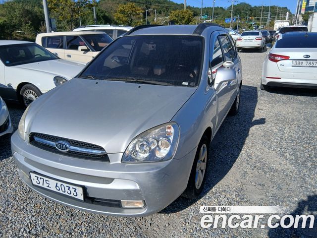 Kia Carens LPI 2.0 GLX Deluxe — пробег 295 948 км — фото 2 из 5