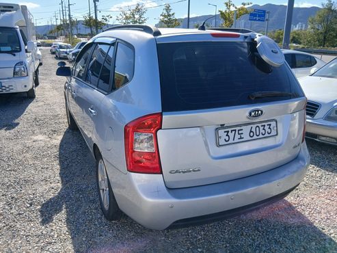Kia Carens LPI 2.0 GLX Deluxe — пробег 295 948 км — фото 3 из 5