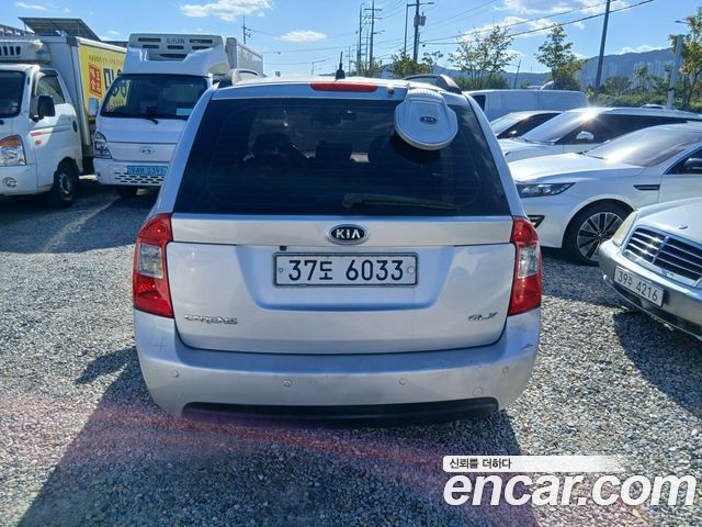 Kia Carens LPI 2.0 GLX Deluxe — пробег 295 948 км — фото 4 из 5