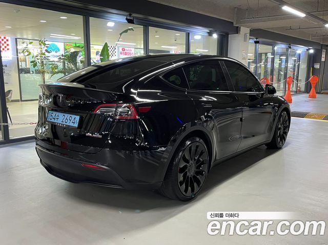 Tesla Model Y Performance AWD — пробег 61 532 км — фото 4 из 5