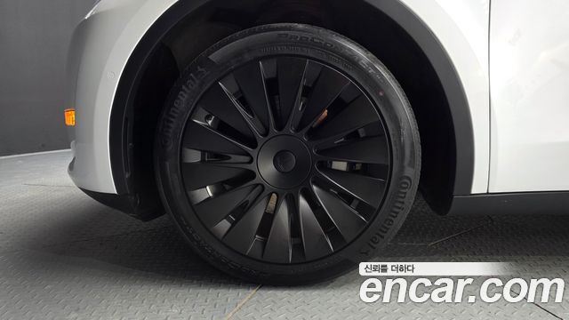 Tesla Model Y Standard Range RWD — пробег 61 327 км — фото 5 из 5