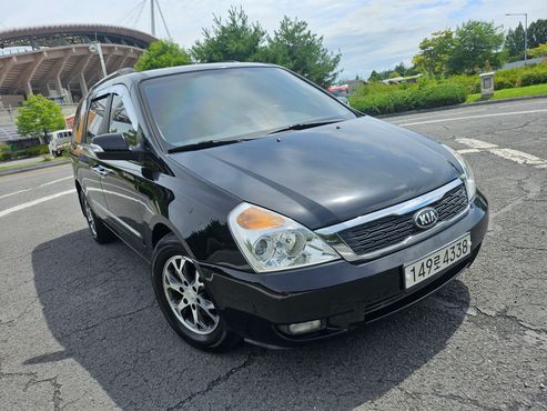 Kia Carnival Grand Carnival GLX Premium — пробег 145 000 км — фото 3 из 5