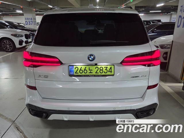 BMW X5 xDrive 50e M Sport — пробег 1 300 км — фото 4 из 5