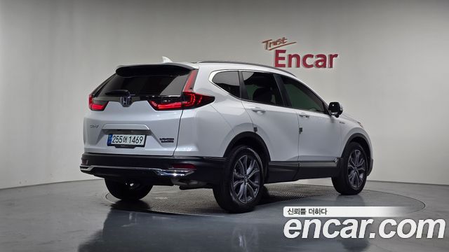 Honda CR-V 2.0 Hybrid Touring 4WD — пробег 77 334 км — фото 2 из 5