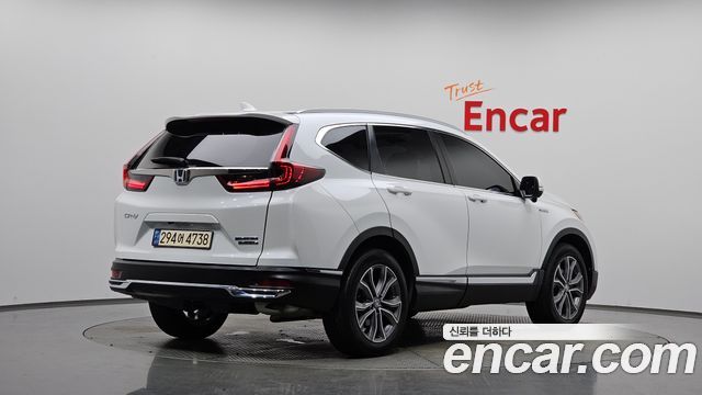 Honda CR-V 2.0 Hybrid Touring 4WD — пробег 63 385 км — фото 2 из 5