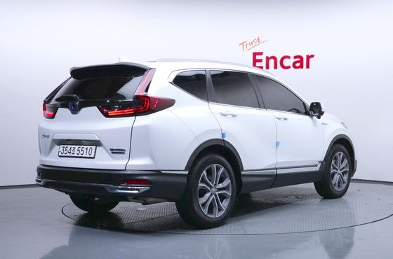 Honda CR-V 2.0 Hybrid Touring 4WD — пробег 85 182 км — фото 2 из 5