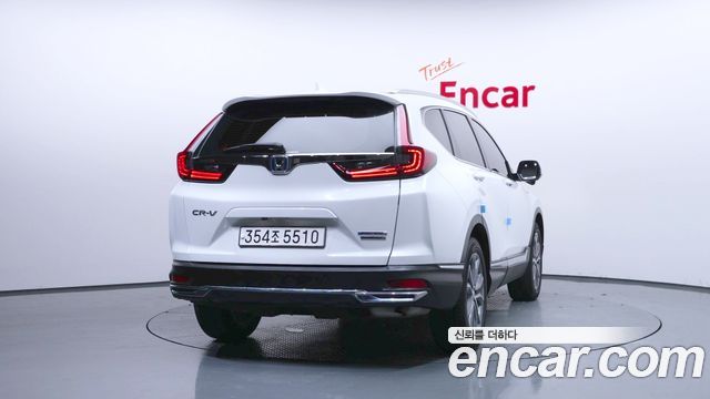 Honda CR-V 2.0 Hybrid Touring 4WD — пробег 85 182 км — фото 4 из 5