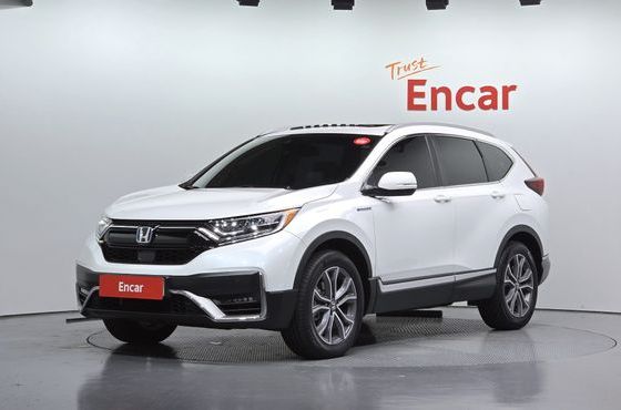 Honda CR-V 2.0 Hybrid Touring 4WD — пробег 55 299 км — фото 1 из 5