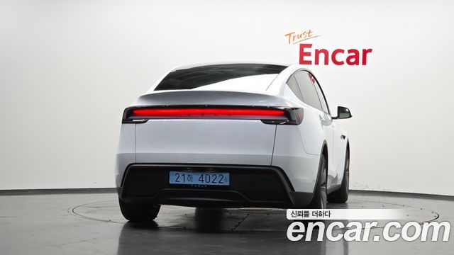 Tesla Model Y Premium RWD — пробег 4 936 км — фото 4 из 5