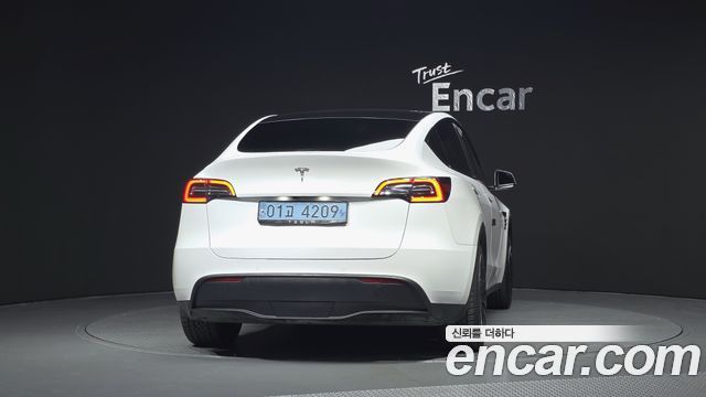 Tesla Model Y Standard Range RWD — пробег 79 269 км — фото 4 из 5