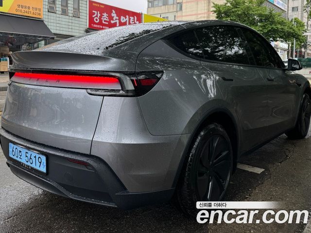 Tesla Model Y Premium RWD — пробег 2 850 км — фото 2 из 5